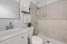 Full Bathroom with Shower, Vanity and Mirror, Toilet, Shampoo/Conditioner/Body Wash Dispenser