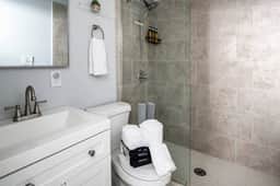 Spacious shower with complimentary body wash, shampoo and conditioner with detachable shower wand. Bath towels and makeup towels provided.