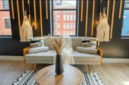 We have updated this sofa to a black, 3 - seater sofa.