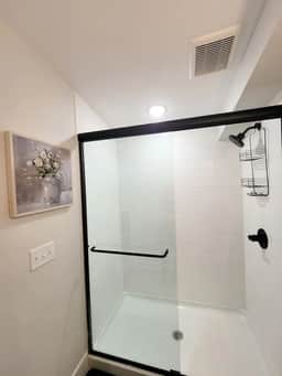Take a step inside this luxurious walk-in shower that will help you decompress and refresh.