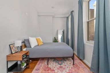Bedroom - Large windows, Floor mirror, End Tables, Noise Machine, Alarm Clock, Blackout Curtains