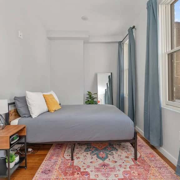 Bedroom - Large windows, Floor mirror, End Tables, Noise Machine, Alarm Clock, Blackout Curtains