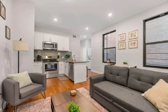 Living Room - Sectional Sofa Bed, Arm Chair, Console Table/Elevated Desk