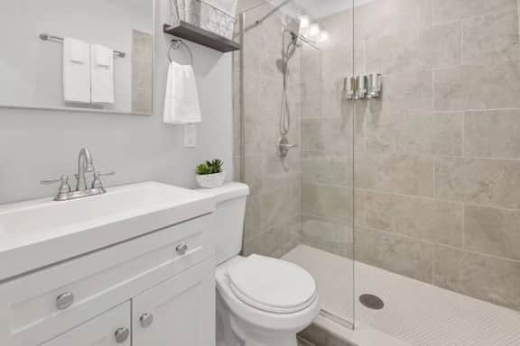 Full Bathroom with Shower, Vanity and Mirror, Toilet, Shampoo/Conditioner/Body Wash Dispenser
