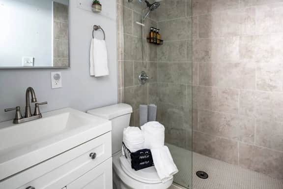 Spacious shower with complimentary body wash, shampoo and conditioner with detachable shower wand. Bath towels and makeup towels provided.