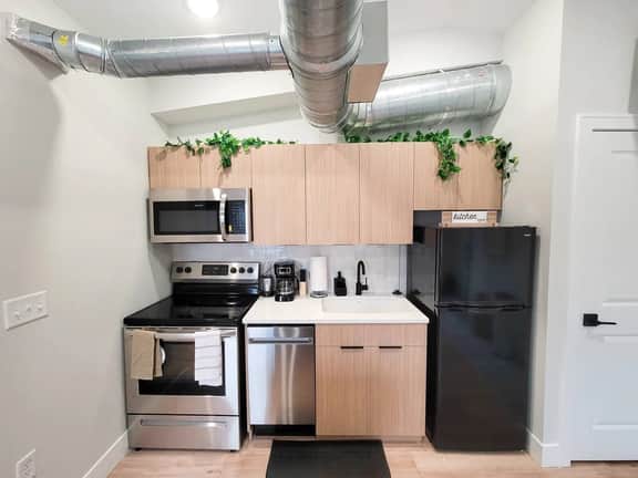Don't forget to utilize the fully stocked kitchen, equipped with all your cooking needs.